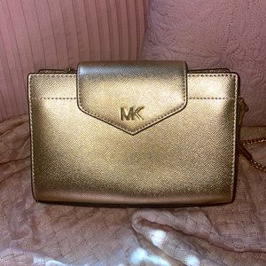 Gold crossbody Michael Kors purse